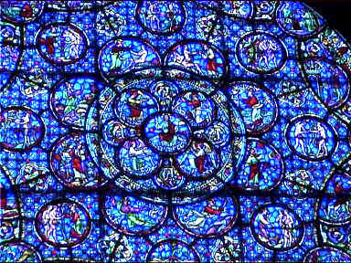 The enormous round stained glass window inside Notre Dame