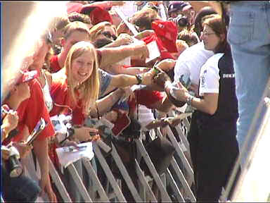 A large crowd of mostly kids was clamouring for Ralf Schumacher's autograph