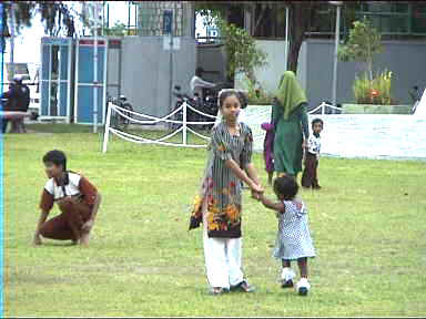 Malidivians are Muslims. Here are some kids playing in a Male park 