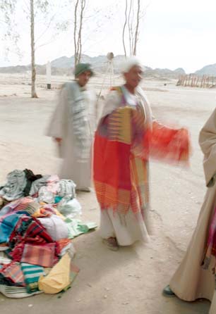 Hawkers in Jalabias selling their wares are everywhere. They start with astronomical prices and proceed to slash them with mind-boggling speed when you say 'no'. These guys were a friendly lot and speedily proceeded to tie me the local turban on my head