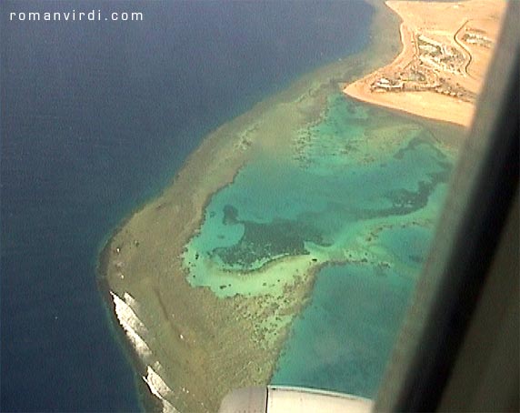 Turquoise water of the Straits of Tiran (Ras Nasrani, near the airport) from the air