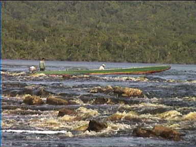 Our long boat frequently needed to climb the river rapids on it's own with everyone walking on the river bank